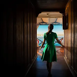 Walnut-lined passage aboard Queens by TIME