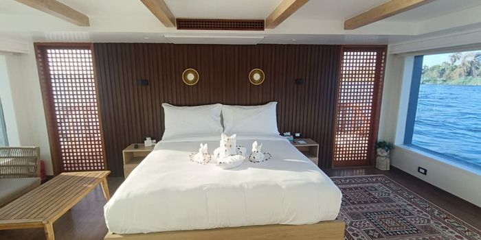 Master bedroom aboard Queens by TIME