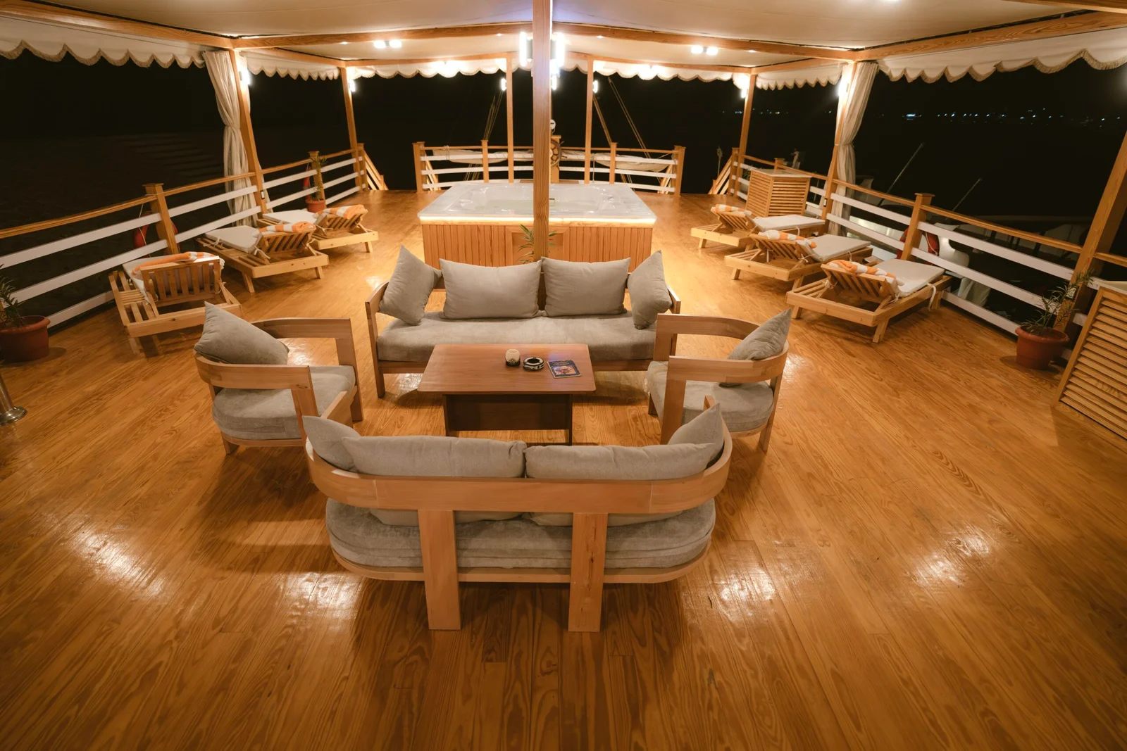 Illuminated evening deck aboard Swan Dahabiya